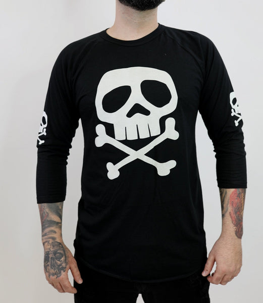 Model wearing black raglan style 3/4 sleeve t-shirt with the Captain Harlock skull and crossbones printed on the chest and on both upper sleeves.