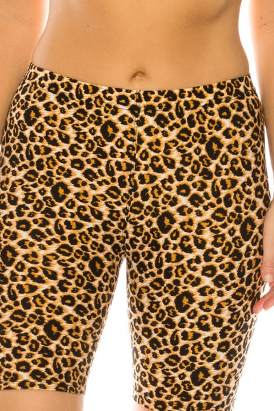model wearing leopard print bike shorts, showing cropped close up from the waist down