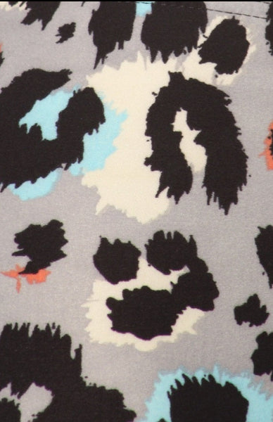 stretchy brushed fiber knit grey, black, white, and coral leopard print fabric swatch close up