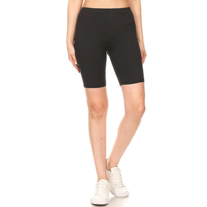 stretchy brushed fiber knit black high-waisted bike shorts with elastic waist band, shown waist down on model