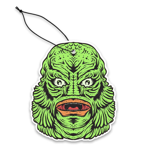 Green creature from the black lagoon face air freshener with a hanging cord on a white background