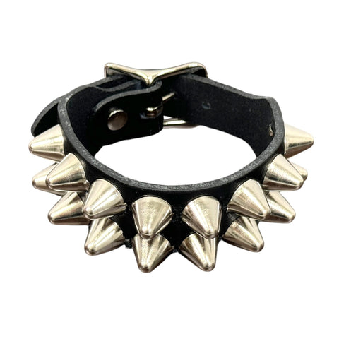 2 row English cone studded black leather cuff with silver metal buckle. Shown closed
