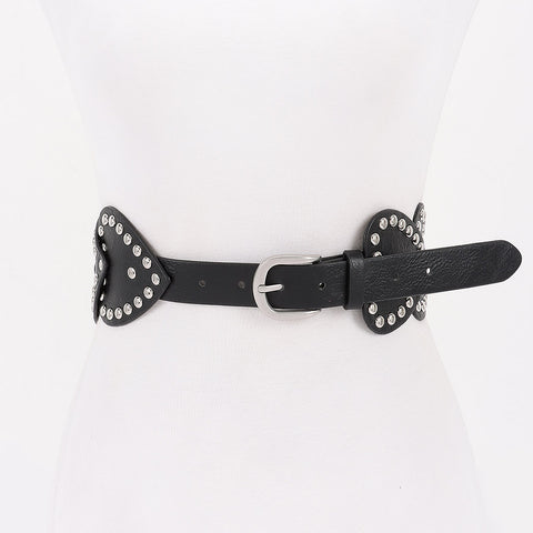 black textured faux leather waist belt made of overlapping heart shapes with round silver metal rivet outlines. Shown from front on dress form