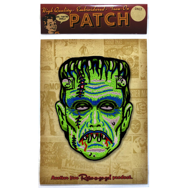 "Son of Frankie" 3.75" x 5"  green face Frankenstein's monster inspired embroidered patch. Shown on display card backing