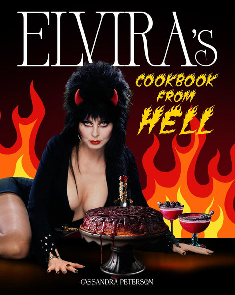 Book cover for 'Elvira's Cookbook from Hell' by Cassandra Peterson, featuring a stylized portrait of Elvira with devil horns and a black outfit against a red and orange flame background, with a chocolate cake and two pink drinks in the foreground.