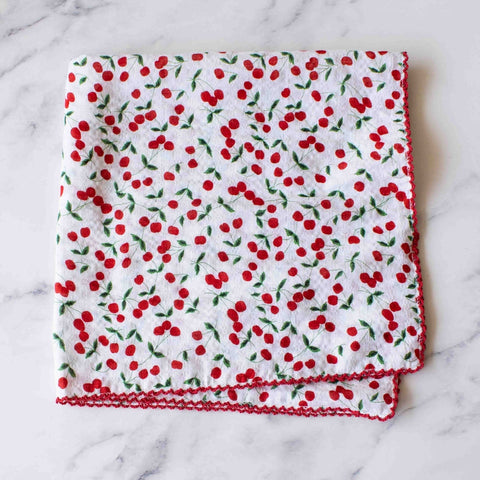 Cotton scarf with cherry pattern on a marble background