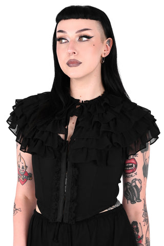 Person wearing a blackchiffon ruffled collar with 4 rows of ruffles and ruffle collar with self tie. Shown from front 