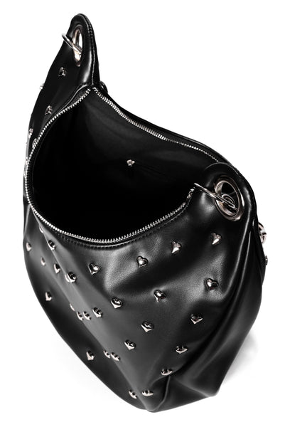 Black heart shaped studded handbag with silver chain strap, oversized silver grommets, and o-ring top zip closure. Shown open from top