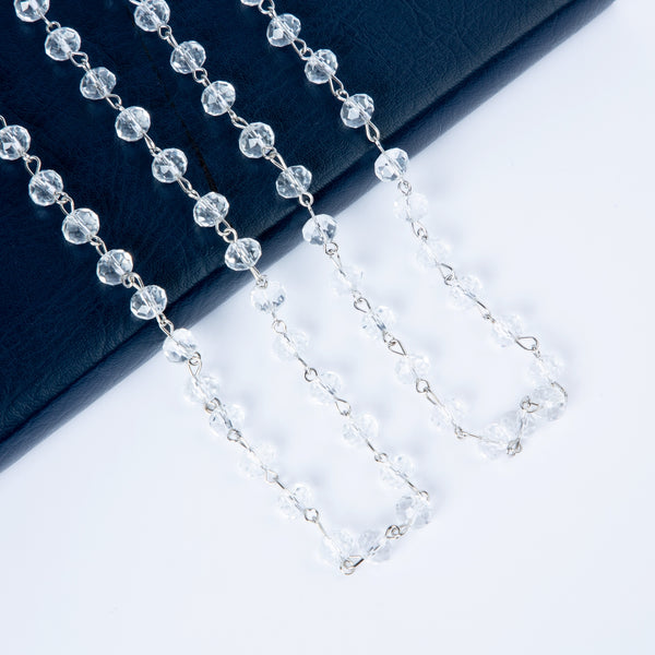 clear round faceted glass linked bead strand necklace in 60" length. Shown doubled in close up