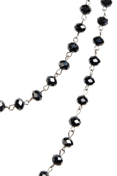 jet black round faceted glass linked bead strand necklace in 60" length. Shown doubled in close up