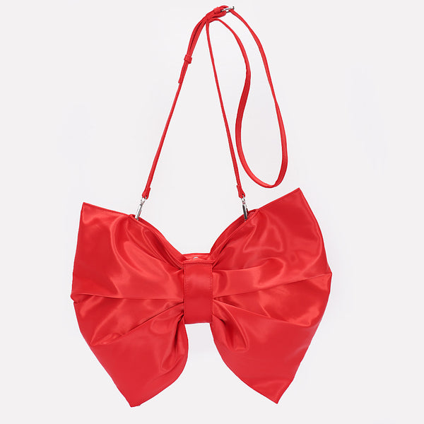 red satin oversized bow-shaped purse with matching crossbody strap