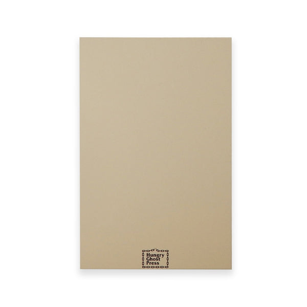 rectangular heavyweight note card with image of smiling cartoon slice of cake with single candle and message "STILL NOT DEAD" in black. Blank back of card with Hungry Ghost Press logo at bottom