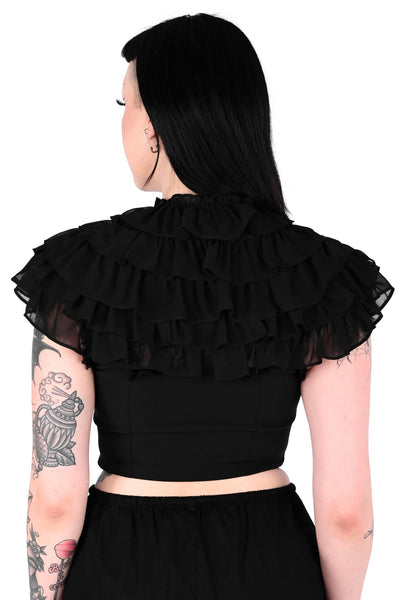 Person wearing a blackchiffon ruffled collar with 4 rows of ruffles and ruffle collar with self tie. Shown from back