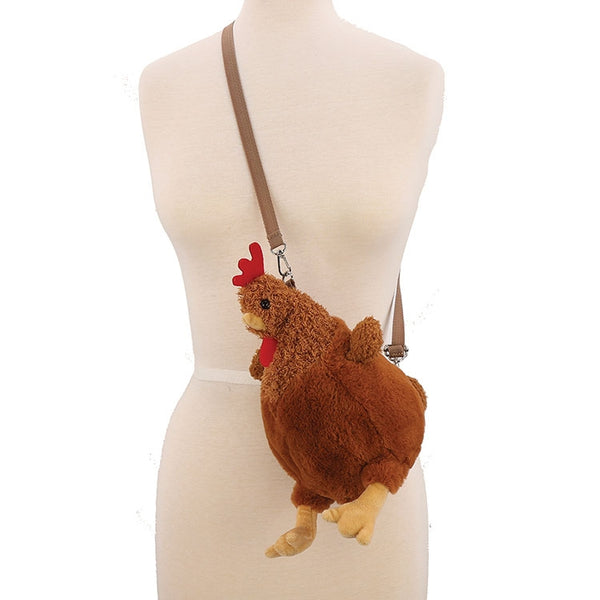 plush brown hen novelty shaped crossbody purse with adjustable removable strap. Shown worn by dress form