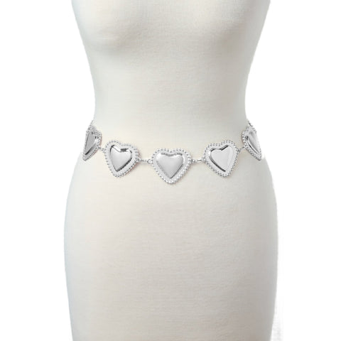 silver metal chain belt with row of puffy heart charms. Shown on dress form