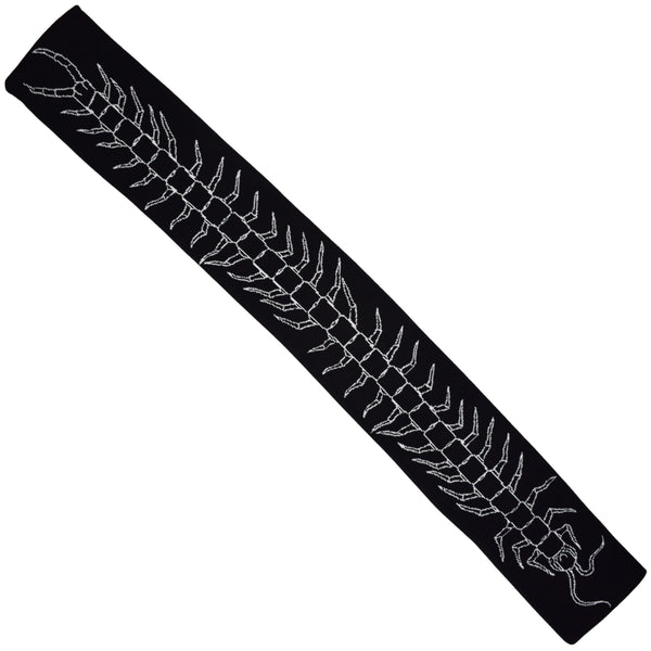 black knit scarf with jacquard knit design of centipede running the length of the scarf. Shown flat