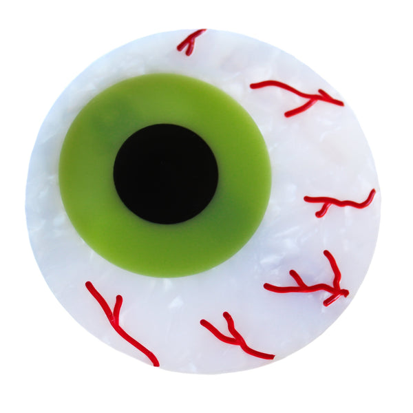 eyeball shaped hair clip with a white marbled white, red carved bloodshot details, a bright light green iris, and a black pupil in the center, on a white background. Shown from front