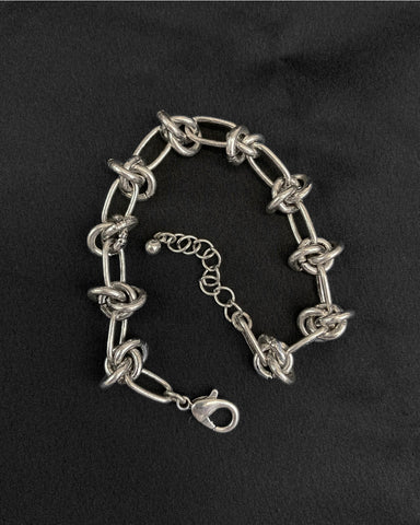 silver metal barbed wire style chain link bracelet with lobster clasp closure and extender