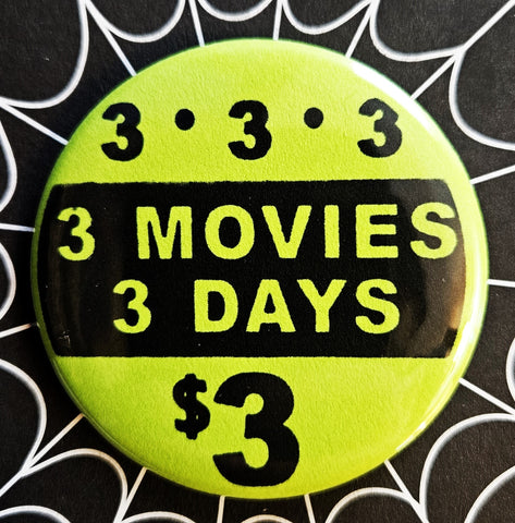 1.25” round button with “3 - 3 - 3” “3 MOVIES 3 DAYS $3” in black on a neon yellow background 