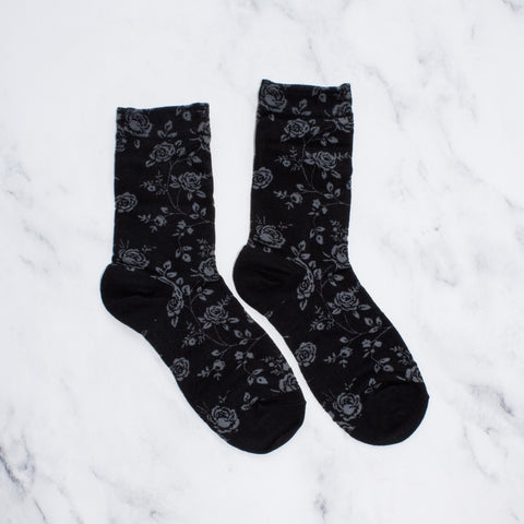 black cotton socks with grey knit-in pattern of roses, rosebuds, and their stems