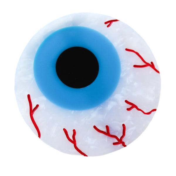 eyeball shaped hair clip with a white marbled white, red carved bloodshot details, a bright light blue iris, and a black pupil in the center, on a white background. Shown from front