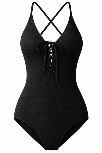 Black one-piece swimsuit with lace-up front and criss-cross spaghetti straps on a white background