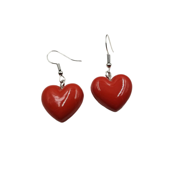 pair of red acrylic puffy heart dangle earrings
