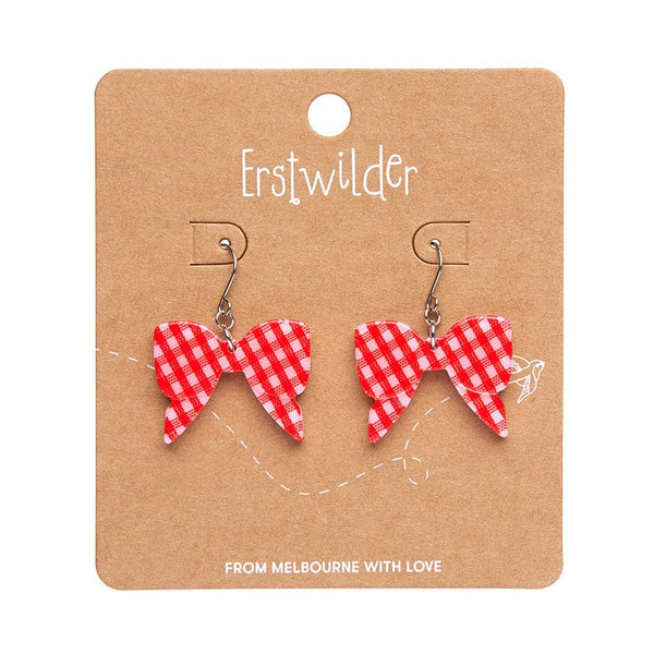 pair Essentials Collection bow shaped dangle earrings in cheery red & white gingham pattern 100% Acrylic resin, shown on illustrated backer card packaging