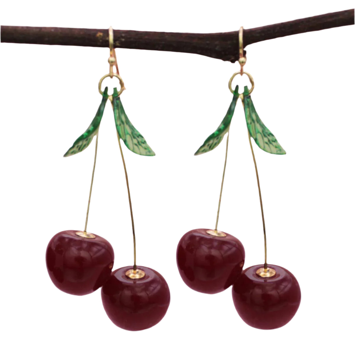 Acrylic dangle earrings of dark red cherries with gold metal stems and translucent green leaves