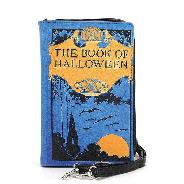 9.25" textured bright blue with black and yellow print book-shaped "The Book of Halloween" clutch purse with detachable wristlet and crossbody straps. Shown from front