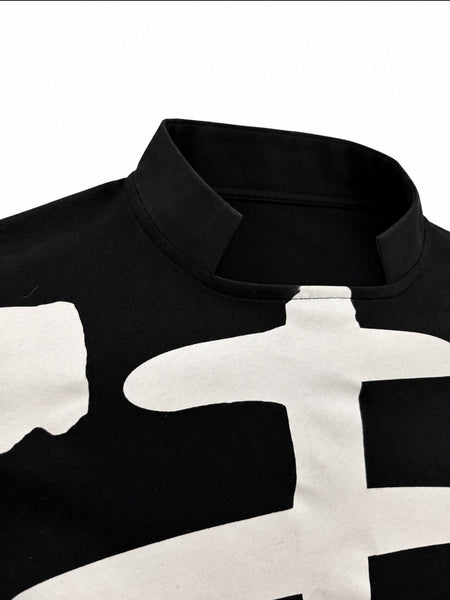 A black long-sleeve mock-neck/mandarin collar shirt featuring a white printed skeleton rib cage and arm bone design on the front, meant to resemble the one worn by Glenn Danzig onstage with the Misfits, shown in close up of collar against a plain white background.