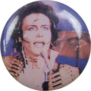 1.25” round pinback button of Adam Ant performing live