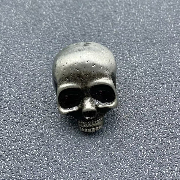 silver metal burnished finish skull brooch