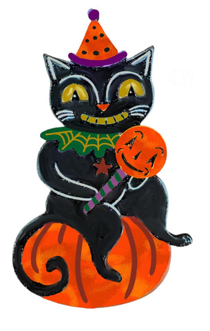 layered acrylic resin brooch of black cat sitting on pumpkin wearing purple, orange, and black polka dotted party hat and green and gold spiderweb ruffle collar