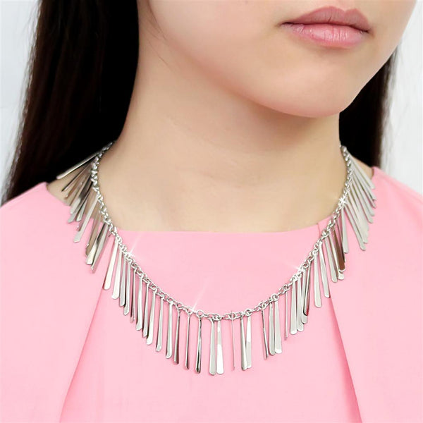 Stainless steel necklace with back toggle closure and small teardrop-shaped pendants shown worn by model