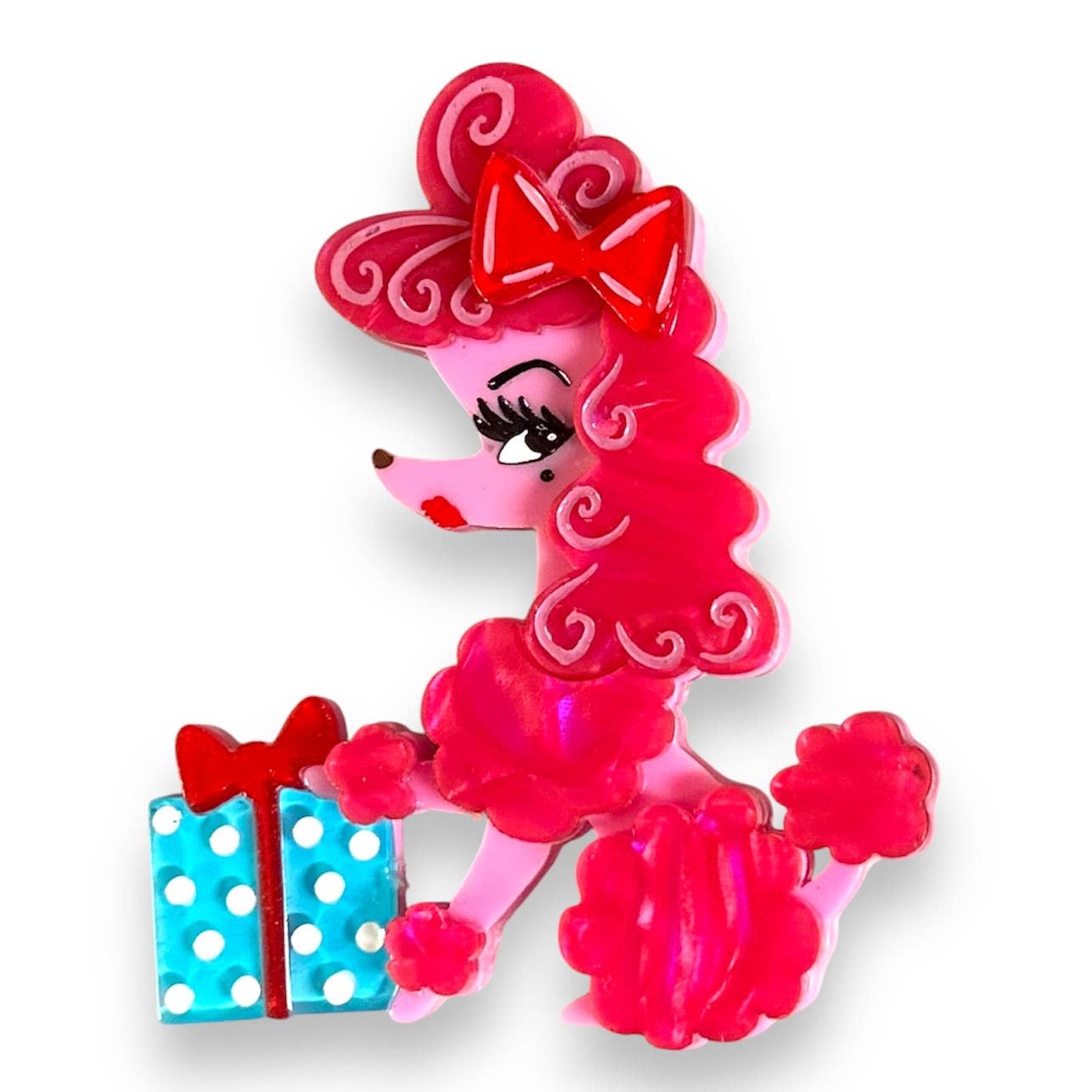Pink pearly resin poodle with a red bow and blue polka dot gift box layered brooch