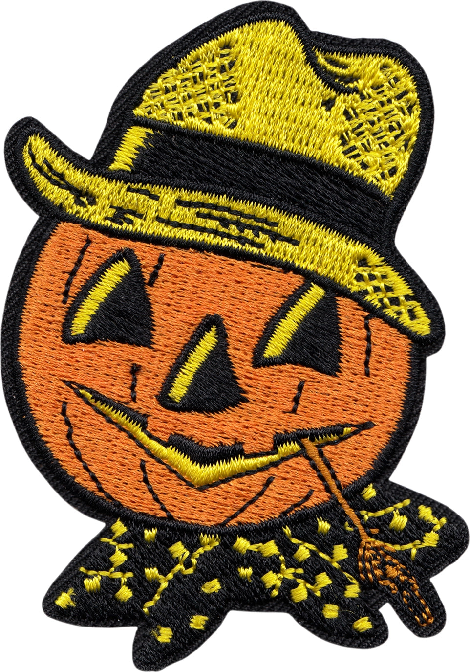 patch of a vintage style scarecrow decoration, featuring carved pumpkin head with a straw hat and kerchief.