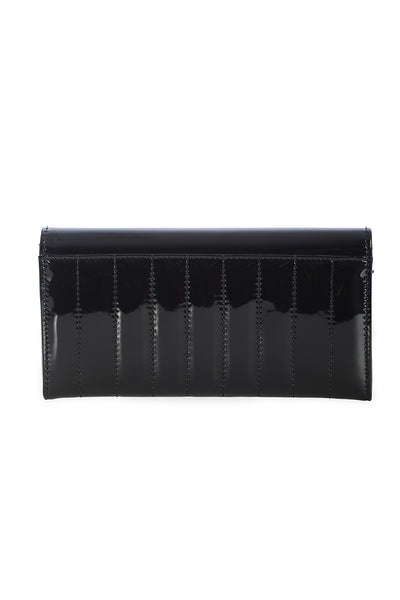shiny black patent vinyl wallet with black channel stitching. Shown closed from the back 