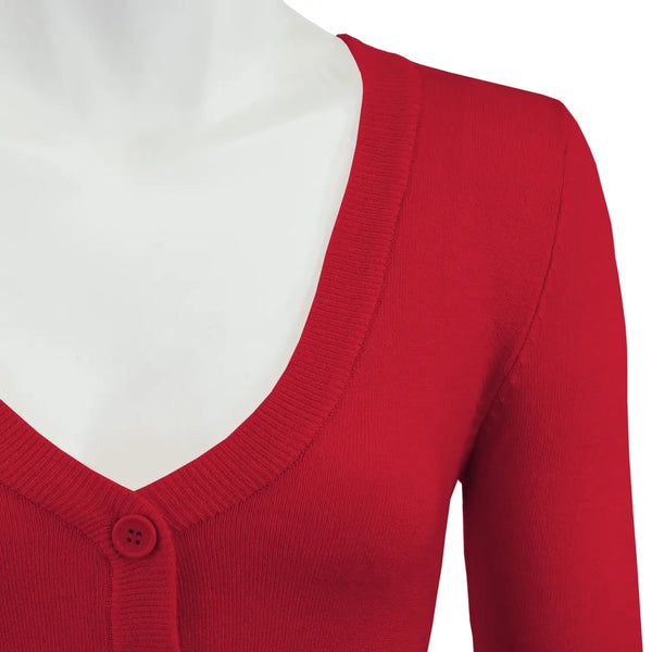 A close-up of a red knit cardigan sweater on a white mannequin torso, showing the V-neck, ribbed trim, and a single button closure.
