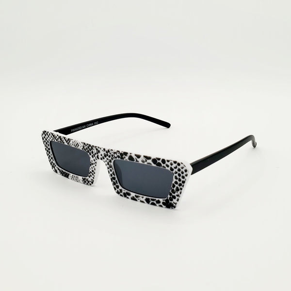 80s style narrow flat bridge matte finish black and white snake print plastic frame sunglasses with solid black arms, shown 3/4 view