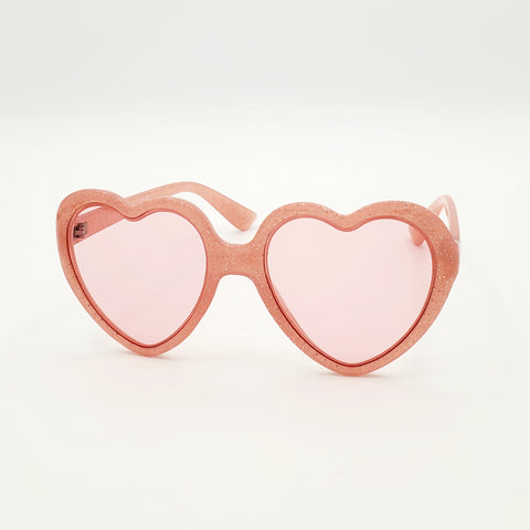 Pale semi-translucent pink with silver glitter plastic frame heart-shaped sunglasses with matching rose pink lenses