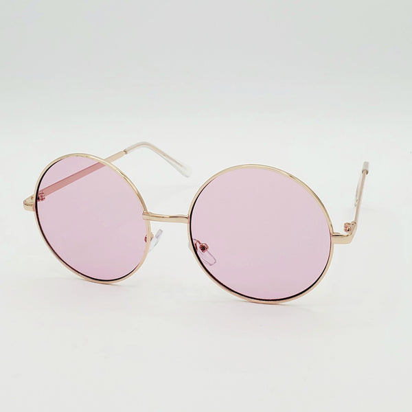 2 1/4” round sunglasses with thin gold metal frames and colorful pale pink tinted lenses