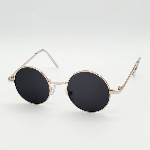 1 1/4” round sunglasses with thin gold metal frames and black lenses