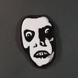 Black and white embroidered patch of Pazuzu/Captain Howdy, the demon from The Exorcist