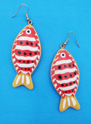 pair of orangey-yellow acrylic Clownfish earrings with vibrant white, black, and red painted details