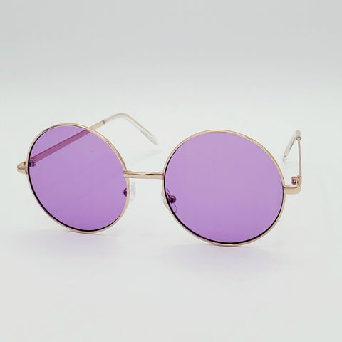 2 1/4” round sunglasses with thin gold metal frames and colorful purple tinted lenses