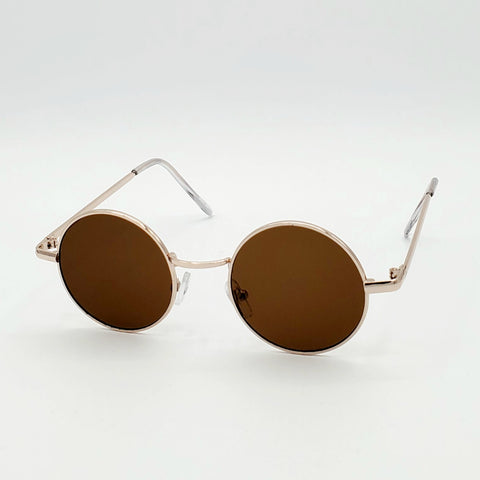 1 1/4” round sunglasses with thin gold metal frames and brown lenses