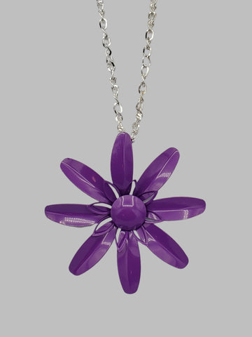 vintage-inspired metal daisy pendant in a regal shade of purple on a 28” long shiny silver metal link chain