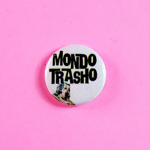 Poster art from the debut movie by John Waters, 1969’s Mondo Trasho featuring lead star, Divine on a 1” round pinback button