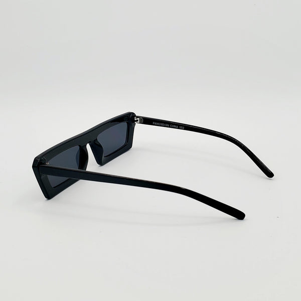 80s style narrow flat bridge black plastic frame sunglasses withdark smoke lens, showing reverse in 3/4 view